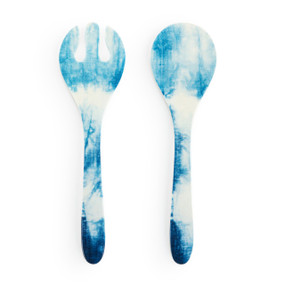 A large plastic set of two serving utensils with a blue and white tie dye pattern.