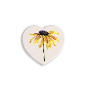 A set of four heart shaped white ceramic coasters with a watercolor image of a black eyed susan.