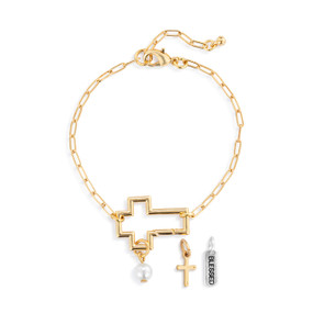 A gold chain bracelet with an open cross that is used to place other charms on.