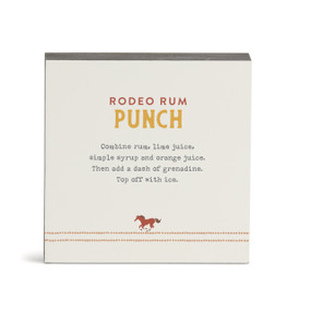 A white square wall art with a basic recipe for a Rodeo Rum Punch written in orange.