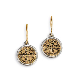 A pair of round gold metal medallion earrings with a cross on them. The earrings have a silver metal rim.