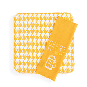 Two square thin cotton towels in yellow and white. One has a houndstooth pattern and the other is yellow and says "Beers to You".