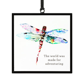 A square suncatcher with a watercolor dragonfly and the saying "The world was made for adventuring".