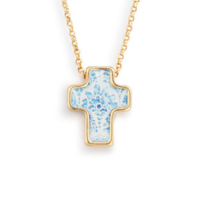 An adjustable gold chain necklace with a cross shaped charm and a blue illustration.