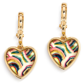 A pair of gold dangling earrings with a heart shaped charm and swirling colorful artwork inside.