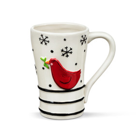 A white ceramic mug with black stripes and snowflakes. There is a raised red cardinal on the front.