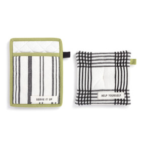 A set of two different fabric hot pads in a black and white lines pattern. Each has a fabric tag, one says "Serve It Up" and the other says "Help Yourself".