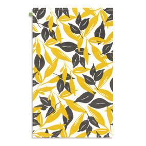 A white kitchen towel with a gold and gray leaf illustration, displayed laid out flat.