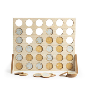 A light wood upright pattern game using silver and gold wood round bell tokens.