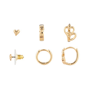 A set of three dainty gold hoop and stud heart earrings.