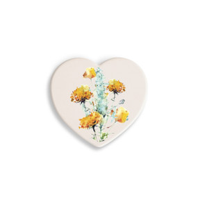 A set of four heart shaped white ceramic coasters with a watercolor image of a sagebrush.