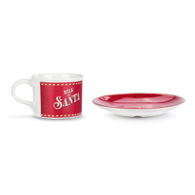A set of red and white dishes including a mug that says "Milk for Santa" and a plate that says "Cookies for Santa".