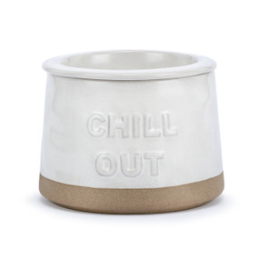 A white ceramic dip chiller bowl with a tan textured base that says "Chill Out" in raised letters on the front.