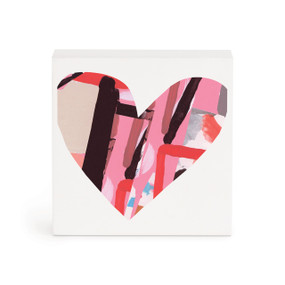 A small white box artwork of a heart shape with a pink and black abstract image inside.
