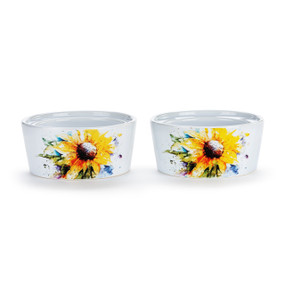 Two white ceramic ramekins with a watercolor image of a sunflower, displayed at a slight angle to show the inner rim for stacking.