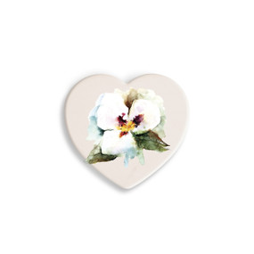 A set of four heart shaped white ceramic coasters with a watercolor image of a sego lily.