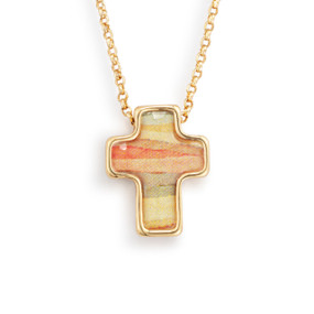 An adjustable gold chain necklace with a cross shaped charm and an orange and yellow illustration.