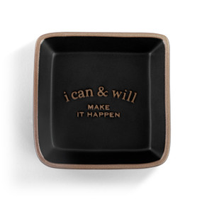 A square black ceramic trinket dish with a tan textured rim that says "i can & will Make It Happen" on the inside.