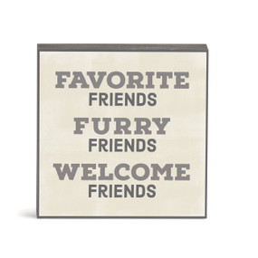 A small square cream wall art with the saying "Favorite friends furry friends welcome friends".