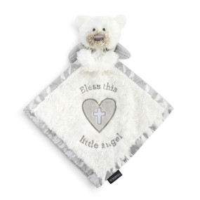A white fuzzy blankie with a gray edge and embroidery that says "Bless this little angel". The blankie has the face and gray wings of an angel bear.