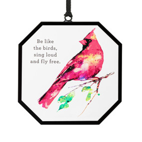 A hexagon shaped suncatcher with a watercolor cardinal and the saying "Be like the birds, sing loud and fly free."