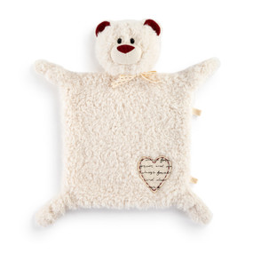 A cream plush blankie with the head of a teddy bear with dark red ears and nose. There is a heart shaped cream fabric patch with script writing on the bottom right corner.