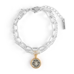 An adjustable double silver chain bracelet with a round silver metal compass medallion with a gold metal rim.