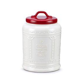 A white textured ceramic cookie jar with a red lid. The jar says "Cookies Make the Heart Happy".
