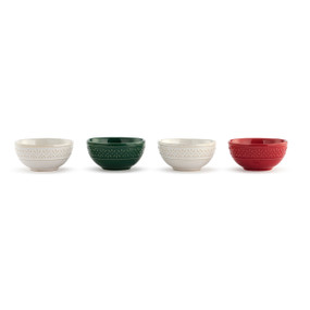 A set of four ceramic bowls in red, green and white with a decorative pattern around the outside.