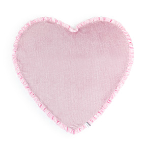 A pink heart shaped blanket with a ruffled pink satin edge.
