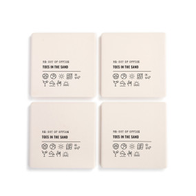 A set of four white ceramic coasters with the saying "RE: Out of Office Toes in the Sand" with a set of emoji images related to the beach.
