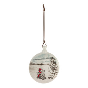 A round disc ornament with the image of Pooh and Piglet sitting in a snowy scene.