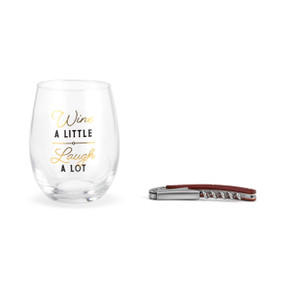 Clear stemless wine glass with the saying "Wine A Little Laugh A Lot" next to a wood handled corkscrew.