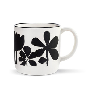 A white ceramic mug with bold flowers in black.