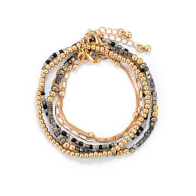 A multi-strand bracelet made with beads and gold chain. The beads are primarily in shades of gray and gold.