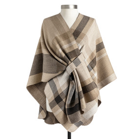 A brown plaid reversible wrap displayed on a mannequin.