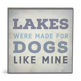 A square gray wall art with the saying "Lakes were made for dogs like mine".