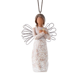 Front: Angel Ornament with wire wings, darker skin, arms crossed over gold heart, dress carved with symbols of remembrance