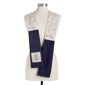 A white Eeyore fabric kitchen boa with dark blue towel ends and a fabric patch with the saying "A day with you," said Eeyore "could never be blue", displayed on a mannequin.