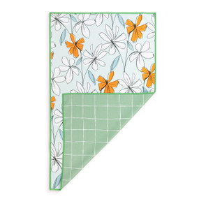 A rectangular double sided towel. One side is light blue with illustrated flowers and the other is green with thin white stripes, displayed with the green corner turned back.