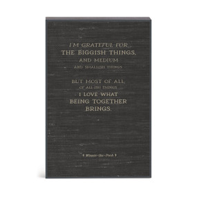 A black Winnie-the-Pooh inspired wall art with a message about being grateful for being together.