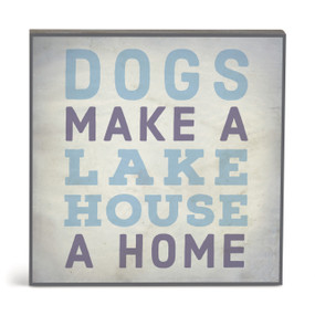 A square gray wall art with the saying "Dogs make a lake house a home".