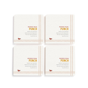 A set of four white square coasters with a basic recipe for a Rodeo Rum Punch written in orange.