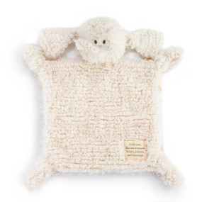 A fuzzy cream blankie with the face and long trunk of an elephant and a fabric patch in the corner that says "Little One, You are wrapped in love, prayers and blessings".