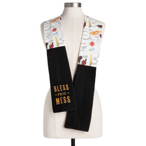 A white fabric "stains" boa with black towel ends. One end says "Bless this Mess", displayed on a mannequin.