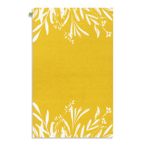 A yellow kitchen towel with a white leaf illustration, displayed laid out flat.