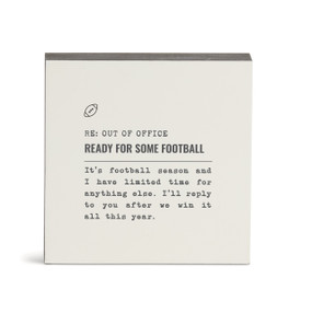 A white square wall art with the saying "RE: Out of Office Ready for some Football" with a short write up about someone not working due to watching football.