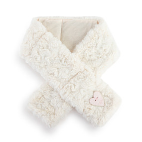 A cream neck wrap with a heart shaped diffuser attached to one end.