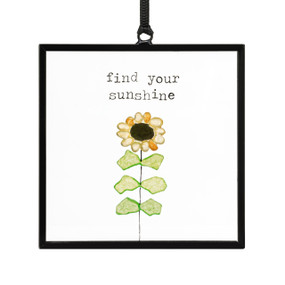 A small square suncatcher with a sunflower made out of small colored stones and the saying "find your sunshine".