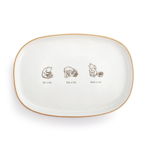 An oval cream platter with three images of Pooh eating honey that say "Sit a bit.", "Eat a bit." and "Rest a bit".